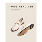 Women with horseshoe buckles and loafers wearing flat bottomed small leather shoes