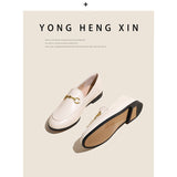 Women with horseshoe buckles and loafers wearing flat bottomed small leather shoes